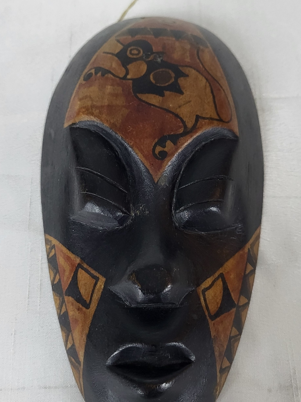 Hand-Carved Black and Brown Decorative Wall Mask